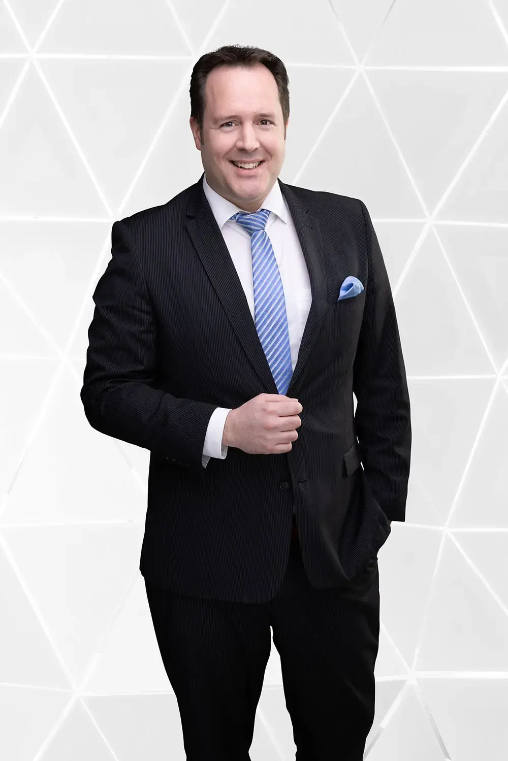 Mitarbeiterfotografie vorm Greenscreen > 100% Effizient